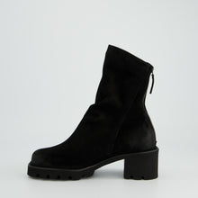 Load image into Gallery viewer, Black ankle boot on a light gray background
