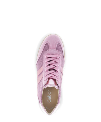 Pink sneaker with metallic accents on a white background