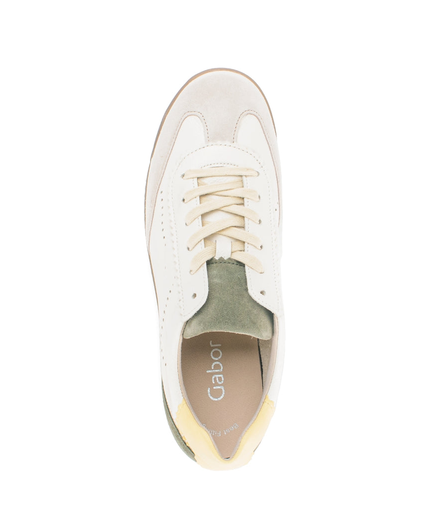 White sneaker with visible brand name on a white background