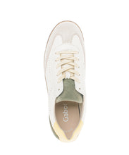 Load image into Gallery viewer, White sneaker with visible brand name on a white background
