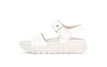 Load image into Gallery viewer, White sandal with a strap on a white background
