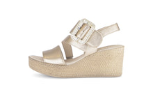 Load image into Gallery viewer, Gold wedge sandal with a strap and buckle on a white background
