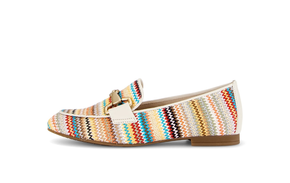 Multicolored striped loafer with a buckle on a white background