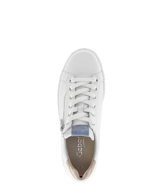 White sneaker with a beige heel on a white background