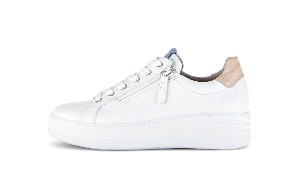 White sneaker with a beige heel on a white background