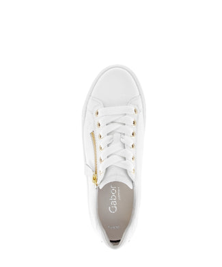 White sneaker with gold zipper on a white background
