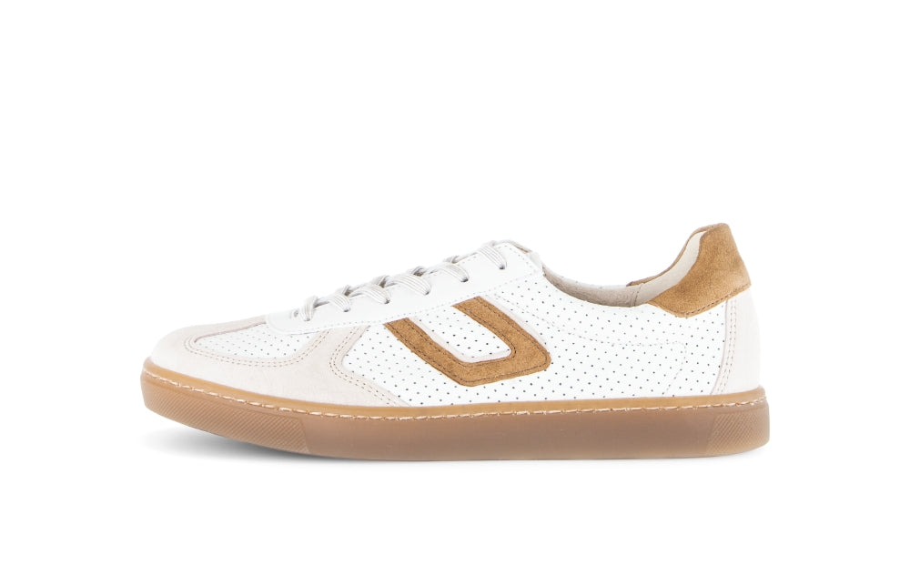 White sneaker with brown accents on a white background