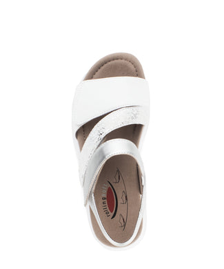 White sandal with a strap on a white background