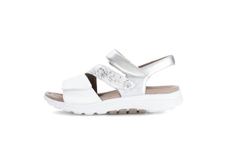 White sandal with a strap on a white background