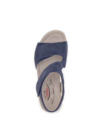 Navy sandal with white sole on a white background