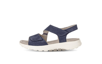 Navy sandal with white sole on a white background