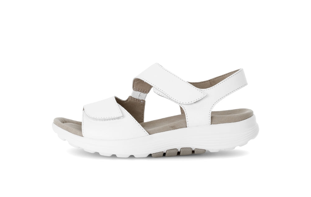 White sandal with a strap on a white background