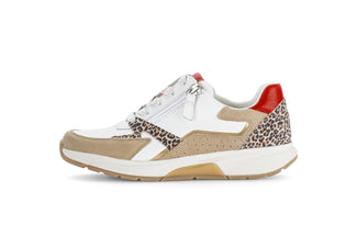 Sneaker with leopard print and red accents on a white background