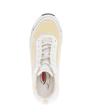 Load image into Gallery viewer, White sneaker with yellow accents on a white background
