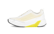 Load image into Gallery viewer, White and yellow sneaker on a white background
