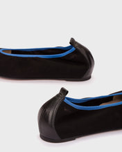 Load image into Gallery viewer, Black ballet flats with blue interior on a white background
