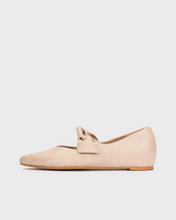 Load image into Gallery viewer, Beige flat shoe with a bow on a light gray background
