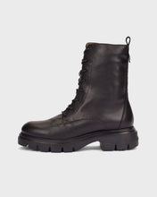 Load image into Gallery viewer, A black leather lace-up ankle boot with a chunky lug sole, shown in a side profile on a light gray background.
