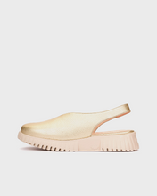 Load image into Gallery viewer, GOLD sandal with a thick sole on a light gray background
