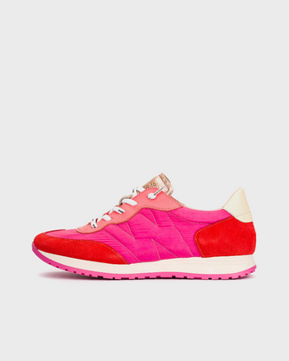 Pink and red sneaker on a light gray background