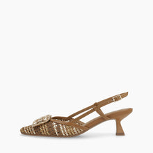 Load image into Gallery viewer, Brown woven sandal with a decorative brooch on a white background
