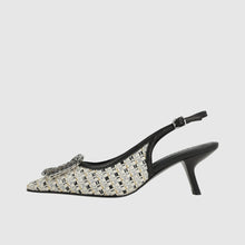 Load image into Gallery viewer, Black and white patterned slingback shoe on a light gray background
