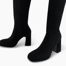 Load image into Gallery viewer, Black knee-high boots on a white background
