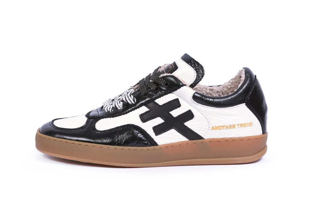 Another Trend White and Black Patent Trainer|A0349391