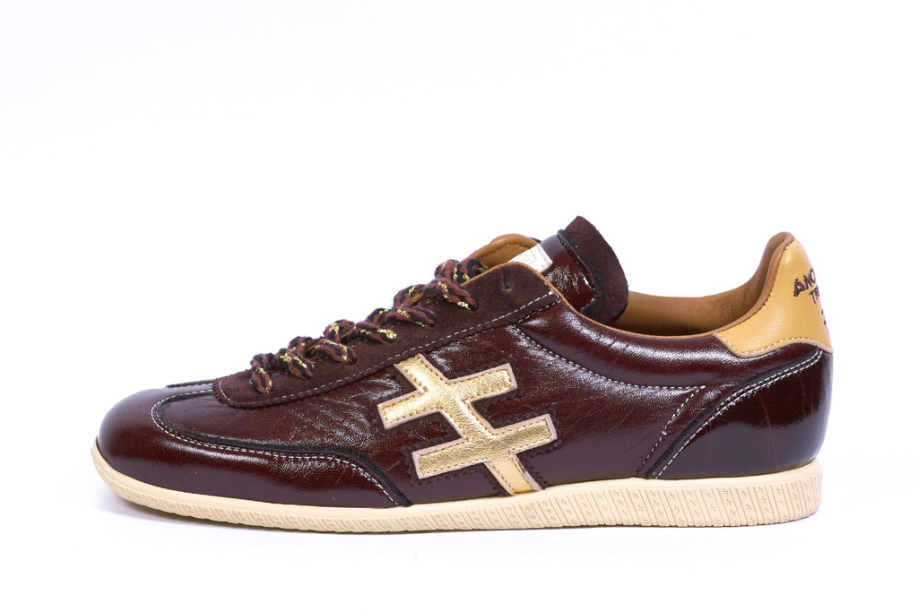 Another Trend Burgundy Patent and Gold Trainer|A0784745