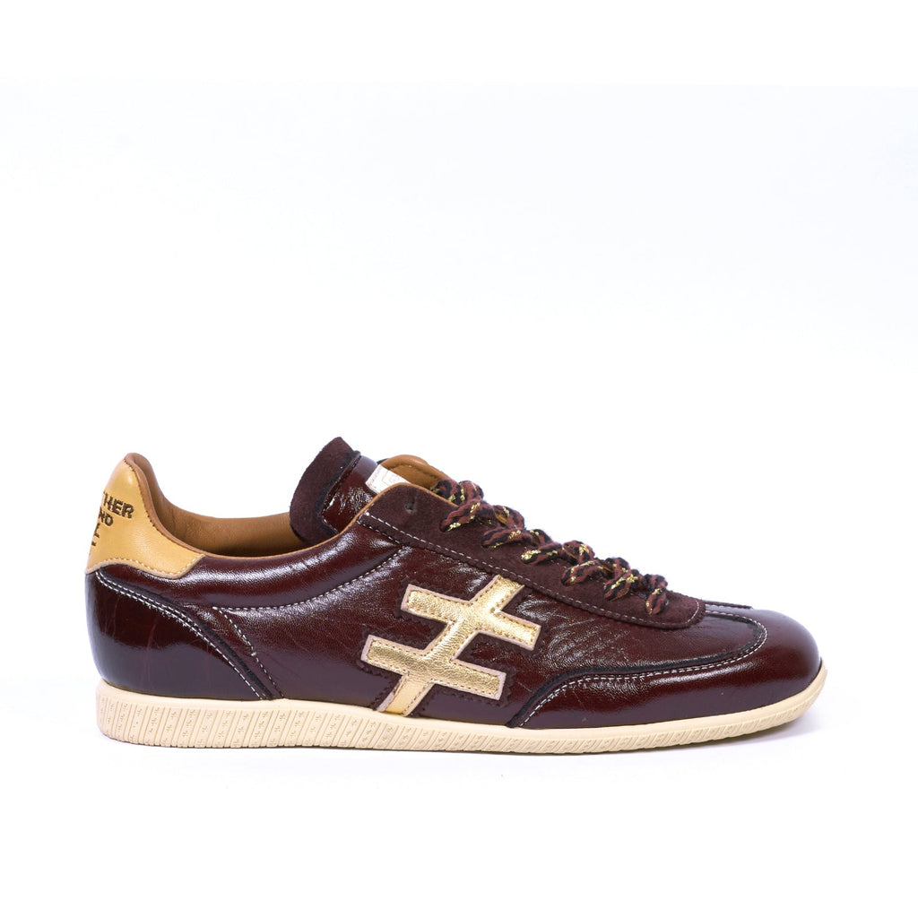 Another Trend Burgundy Patent and Gold Trainer|A0784745