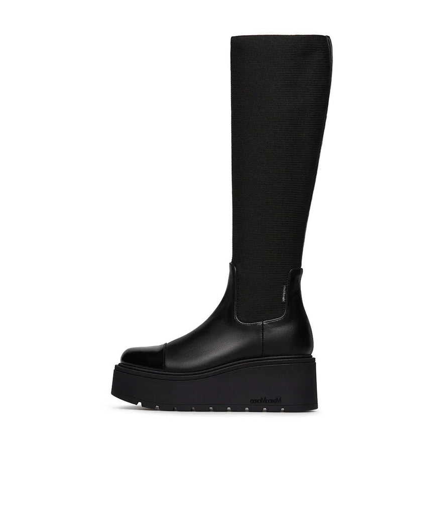 Black knee-high boot on a white background