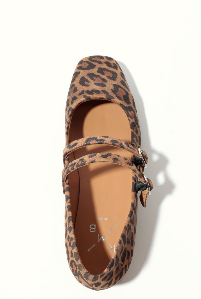 Leopard print flat shoe on a white background