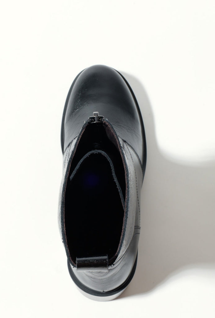 Black boot on a white background