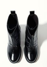 Load image into Gallery viewer, Pair of black leather boots on a white background
