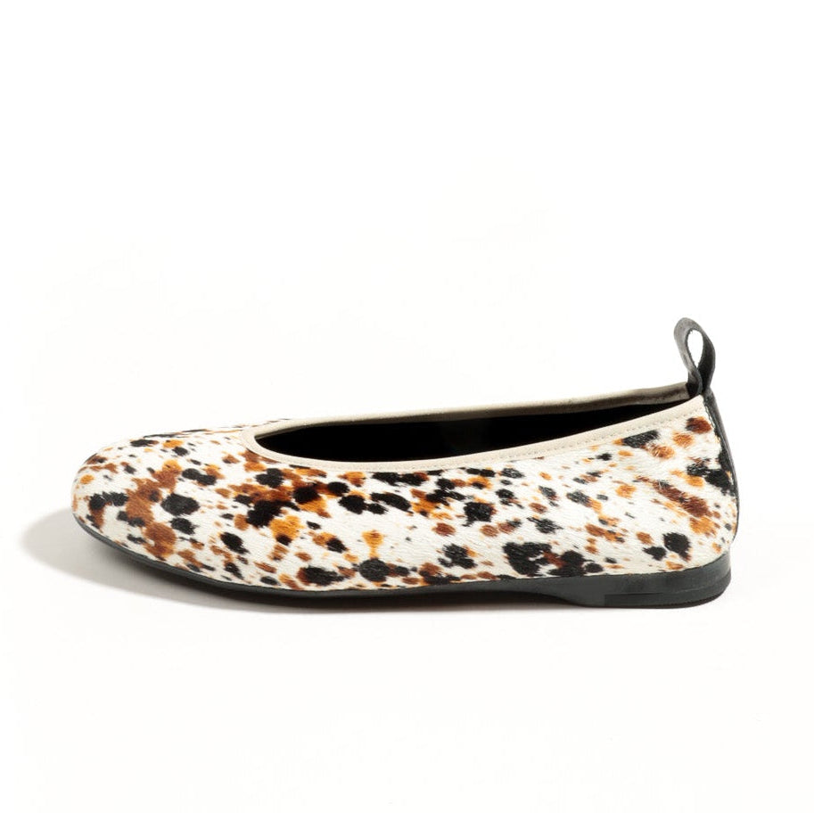 Flats with a multicolor pattern on a white background