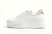 Load image into Gallery viewer, White sneaker with gold accents on a white background
