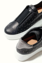 Load image into Gallery viewer, Black slip-on shoes with white soles on a light gray background
