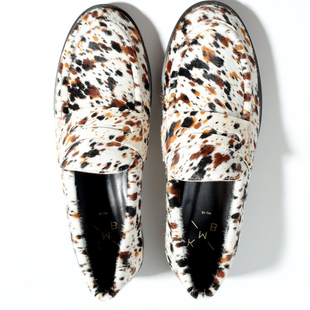 Speckled loafers on a white background