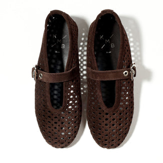 Brown perforated shoe on a white background