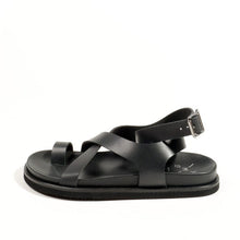 Load image into Gallery viewer, Black slip-on shoe on a white background
