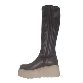 bROWN knee-high boot with beige sole on a white background