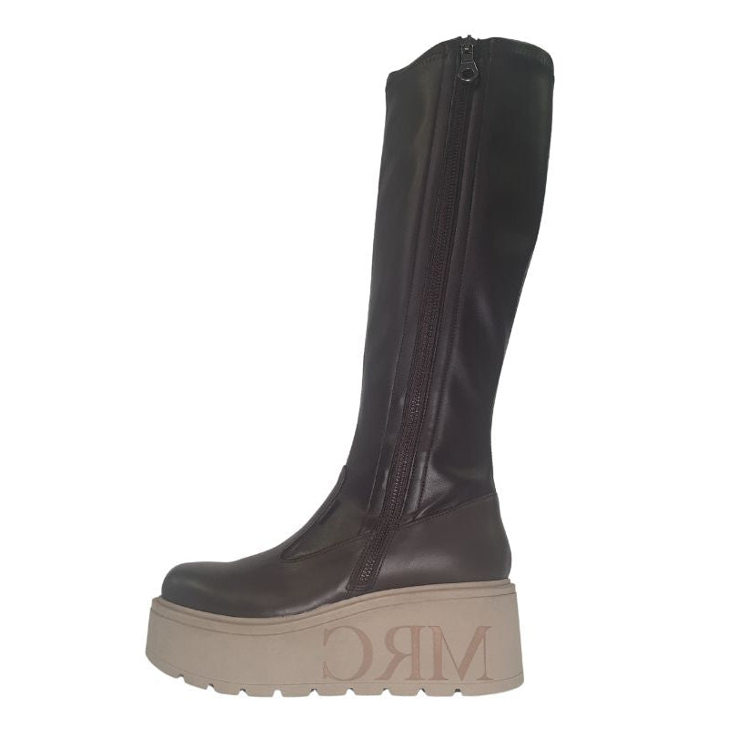 bROWN knee-high boot with beige sole on a white background