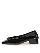 Load image into Gallery viewer, A single black patent leather ballet flat with a low block heel and a small bow detail on the toe, shown in profile against a plain white background.
