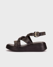 Load image into Gallery viewer, Black sandal with studded details on a light gray background
