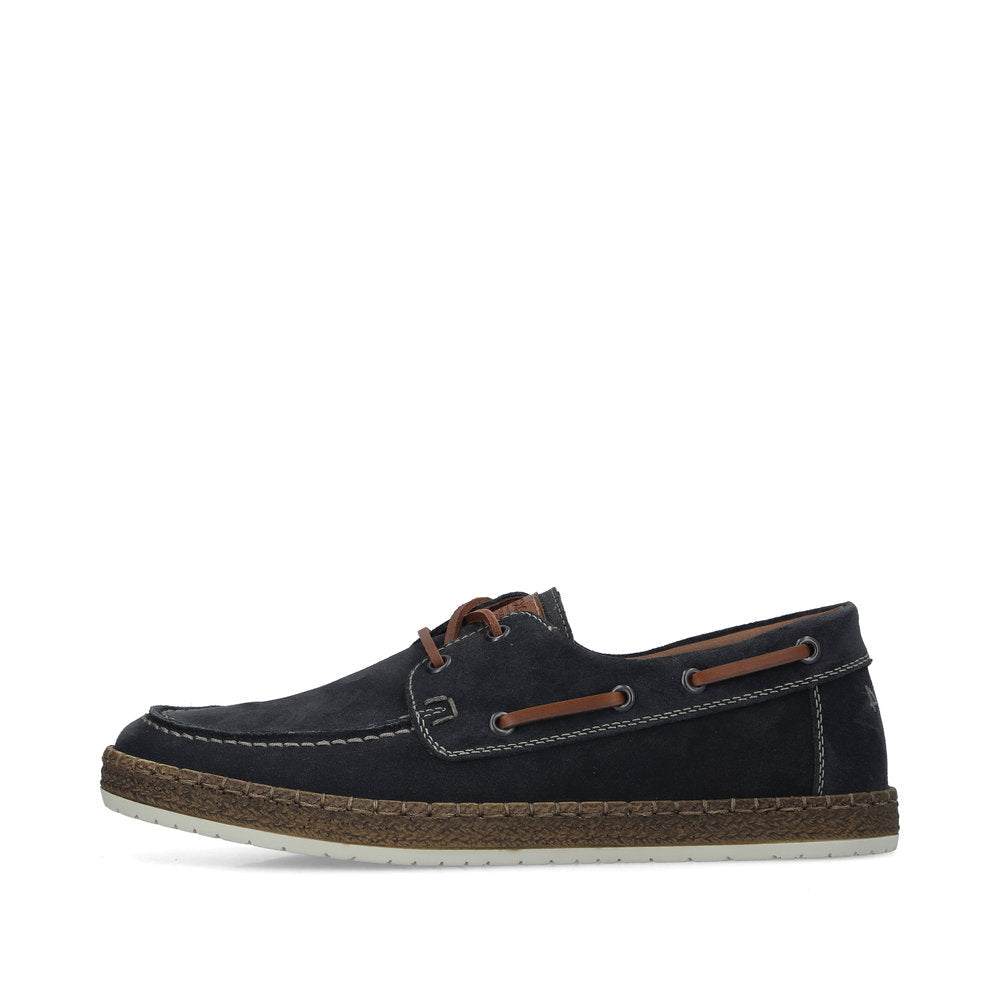Navy blue boat shoe with brown accents on a white background