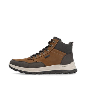 Brown and black hiking boot on a white background