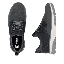 Load image into Gallery viewer, Black sneakers with white soles on a white background
