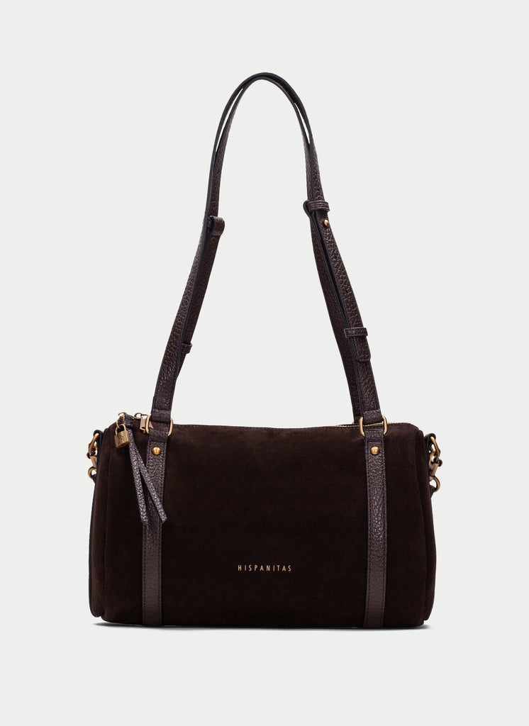 A dark brown suede shoulder bag with black leather trim and straps, featuring gold-tone hardware and the brand name 'NIPPARITAS' printed in gold on the front, set against a light gray background.