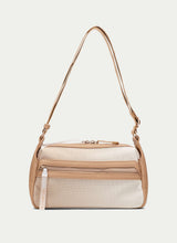 Load image into Gallery viewer, Beige and white handbag with a strap on a light gray background

