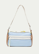 Load image into Gallery viewer, Multicolored handbag with a strap on a light gray background
